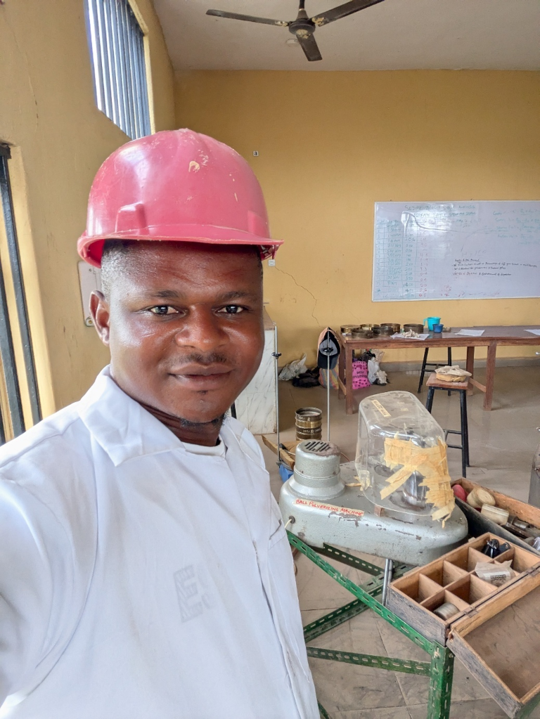Crushing carbonate sample at the geology laboratory for analysis